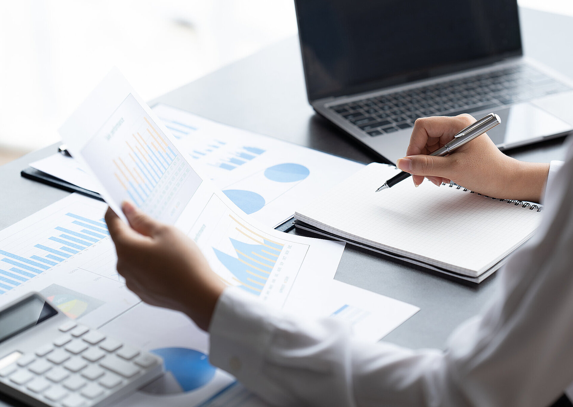 Data Analysis for Business and Finance Concept. Businessman Accounting Calculating Cost Economic Financial data.